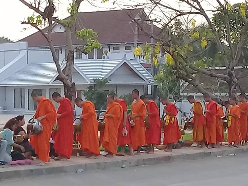 Alms giving near Pongkham