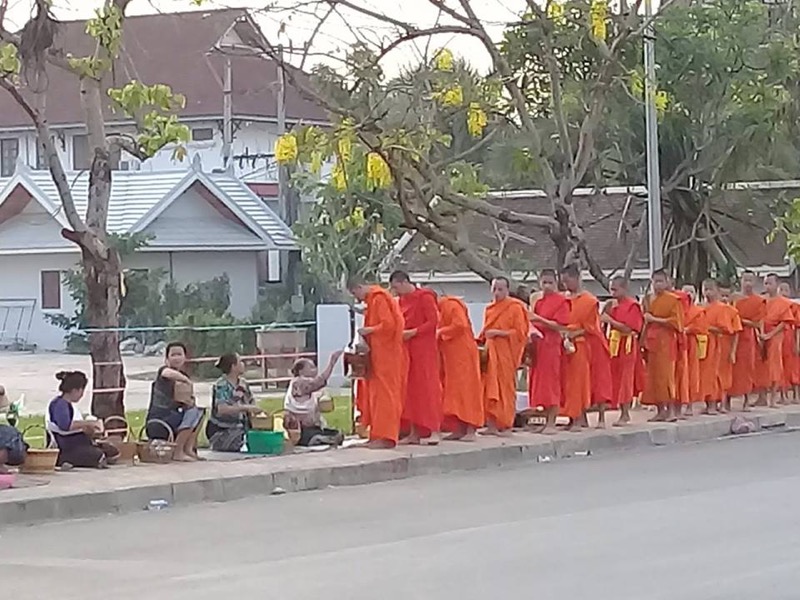 Alms giving near Pongkham